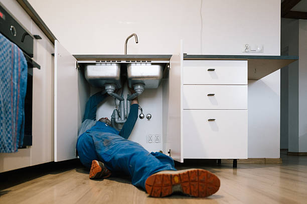 Professional Drain Cleaning technician working in Lake City, GA